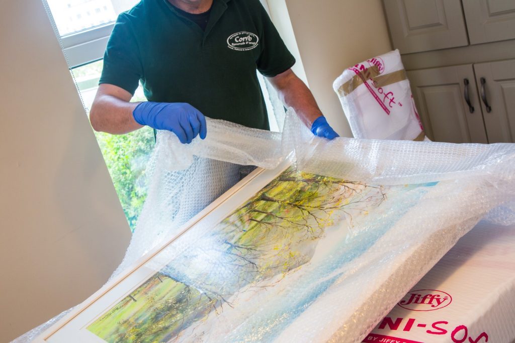 Moving House - packing a painting